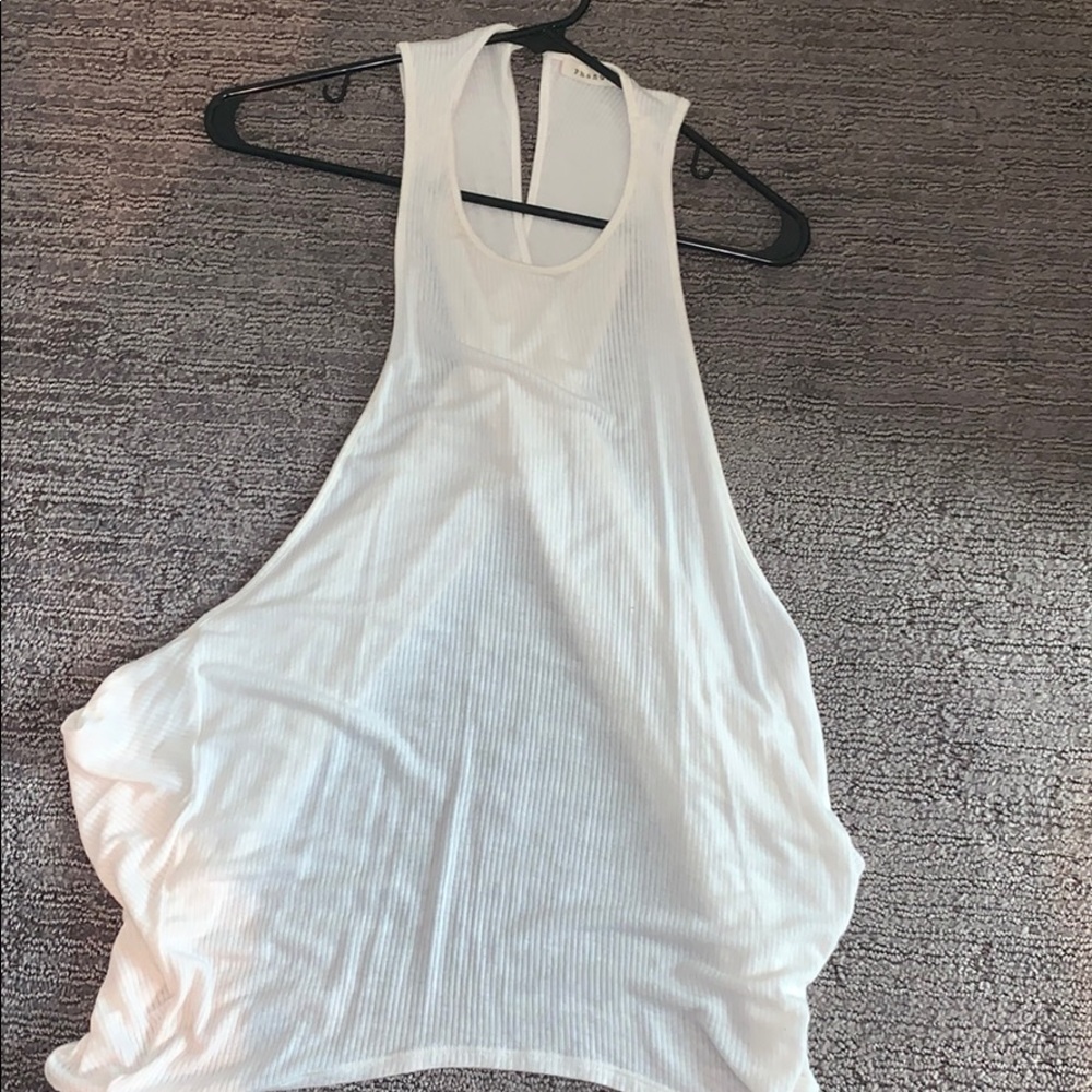 White tank top that crosses in the back.